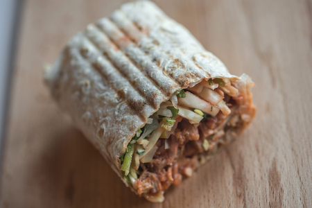 Traditional oriental sandwich with meat, onion and herbsの写真素材