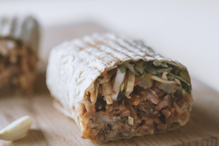 traditional oriental sandwich with meat, onion and herbsの写真素材