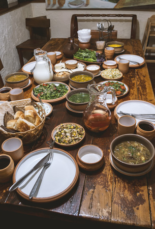 Still life various delicious dishes including starters, main course, sweet compote in Middle Eastern restaurantの写真素材