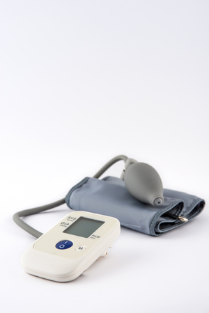 Digital Blood Pressure Monitor on white backgroundの写真素材