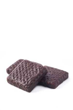 Chocolate cookies with marshmallow isolated on whiteの写真素材