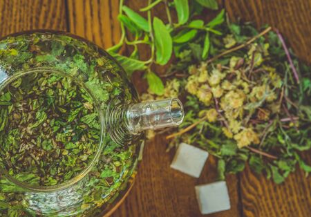 delicious green tea in a beautiful glass bowl on a tableの写真素材