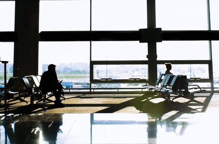 silhouettes of passengers at the airport. travel conceptの写真素材