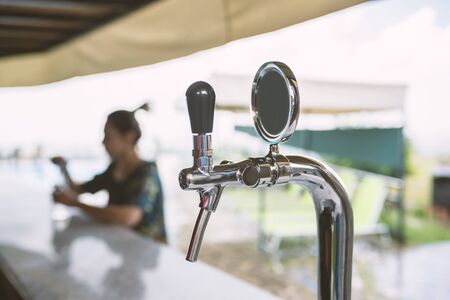 close-up of beer equipment.beer faucet in the beach barの写真素材