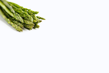 Asparagus on white background. Fresh green asparagus on whiteの写真素材