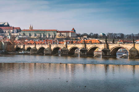 View of the Old Town pier architecture and Charles Bridge over Vltava river in Prague, Czech Republic.の写真素材