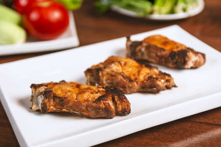 Caucasian shashlik plate with grilled meat. pork bbq
