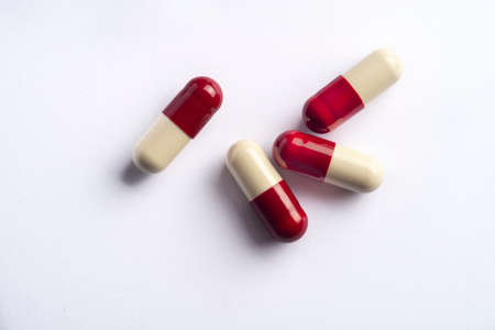 Drug prescription for treatment medication. Pharmaceutical medicament, Pharmacy theme, Heap of red white medicamentの写真素材