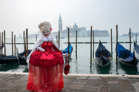 Venice, Italy - February 24, 2020: woman in mask at the Carnival of Venice. The Carnival of Venice is an annual festival, world famous for its elaborate masks.のeditorial素材