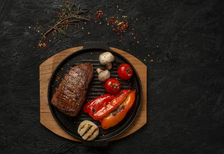 grilled pork steak with vegetables and spices