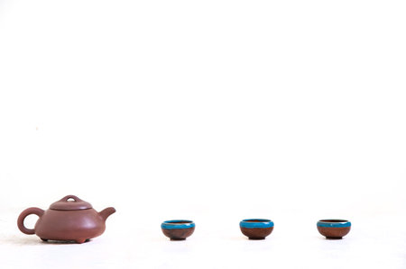 tea set view, Chinese teapot, cups on a white backgroundの写真素材