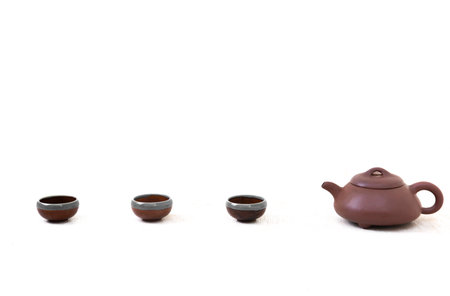 tea set view, Chinese teapot, cups on a white backgroundの写真素材