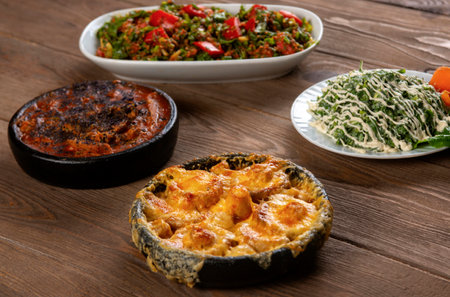 Tasty oriental dishes on a wooden table. Turkish food.