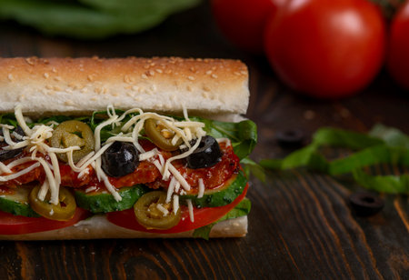 sandwich with olives and tomato, close upの写真素材