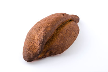 A delicious freshly baked rye bread ruddy on a white background