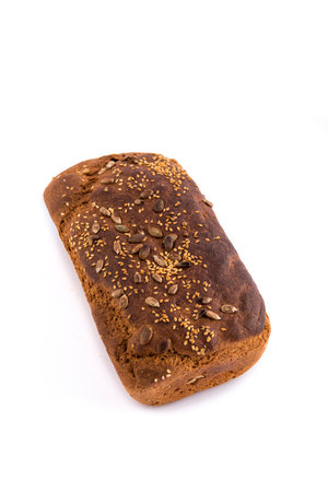 Brown bread on isolated white background. Top view. Flat lay. rye bread