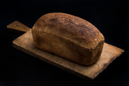 Dark bread on a black background.
