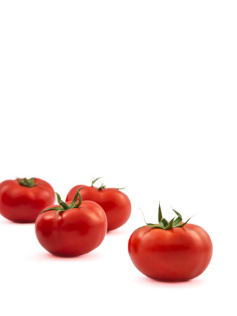 Tomatoes on white background. Isolated tomatoes on white background.の写真素材
