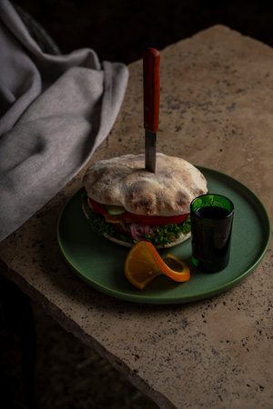 sandwich with meat, tomato, lettuce, cucumber and cheeseの写真素材