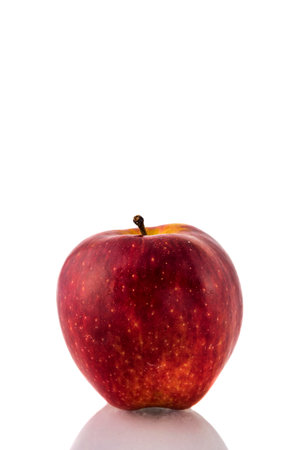Fresh and tasty red apple in white background
