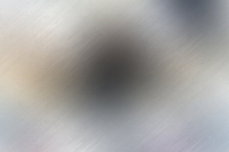 Metal background or texture of brushed steel plate with reflections Iron plate and shinyの素材