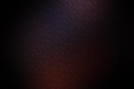 abstract background with a pattern of red and black spots on a black backgroundの写真素材