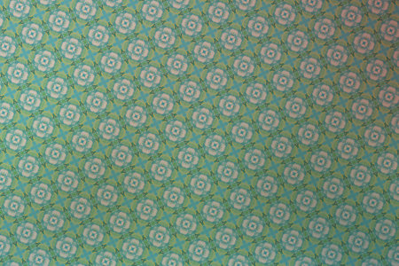 Textile cloth green and blue with a pattern of roses and leaves