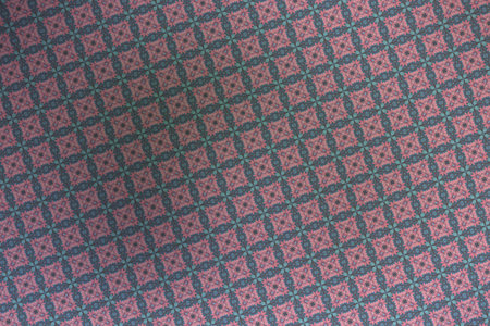 Textile cloth blue and red with a pattern of rhombuses