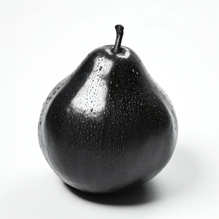 Black pear with water drops on a white background. Close-up.の素材