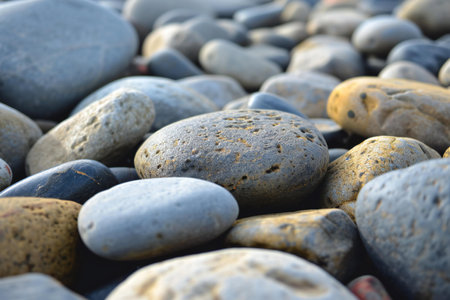 pebble stones on the beach, close-up, backgroundの素材