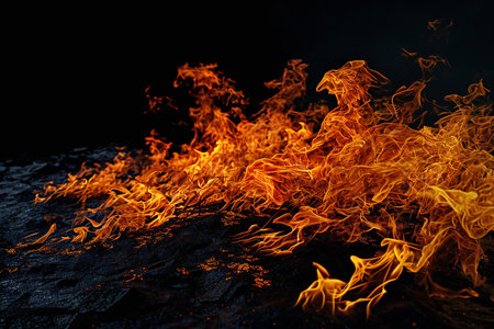 Fire flames on black background. Abstract blaze fire flame texture background.の素材