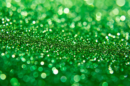 green glitter christmas abstract background. defocused. bokehの素材