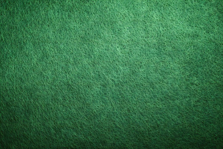 Green felt texture or background for design with copy space for text or image.の素材