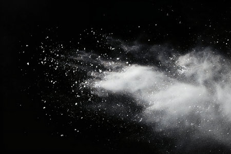 Foto de White powder explosion on black background. Abstract white dust cloud texture. - Imagen libre de derechos