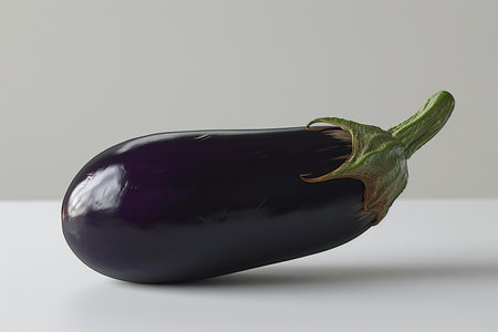 Purple eggplant on a white background. Close-up.の素材