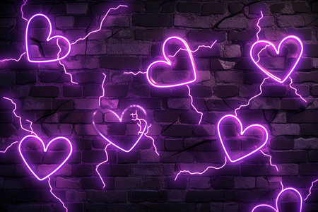 Glowing neon hearts on a brick wall background.の素材