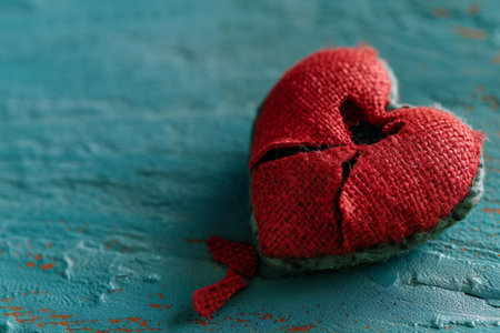 Red heart on a blue wooden background. Valentine's Day concept.の素材