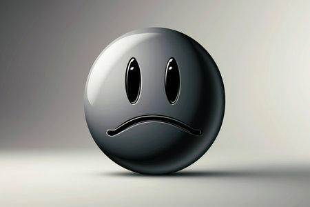Illustration of a black ball with a sad face on a grey backgroundの素材