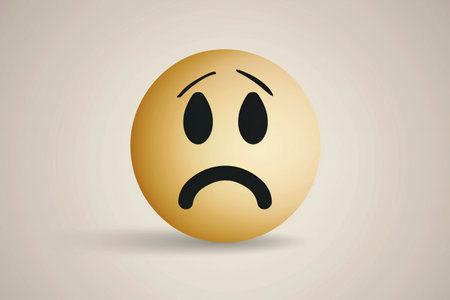 Emoticon with sad expression on a light background.の素材