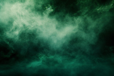 Green smoke on a black background. Abstract background. Design element.の素材