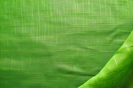 Close up of green silk fabric texture for background, wallpaper or backdropの素材