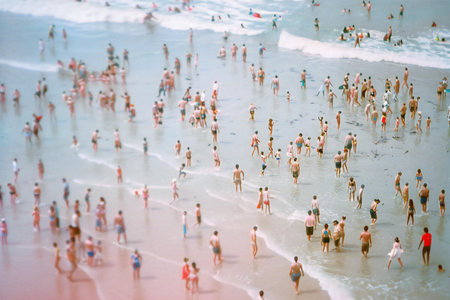 People on the beach in the summer. Top view. Blurred background.の素材