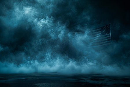 A photo of an american flag blowing in smoke on black backgroundの素材