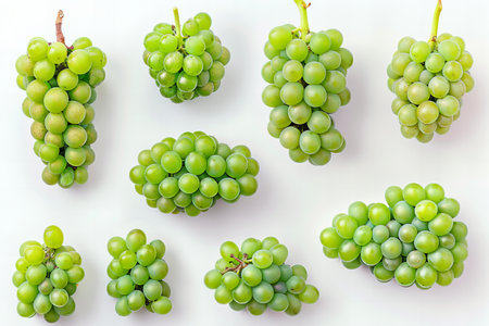 bunch of green grapes isolated on white background. top view.の写真素材