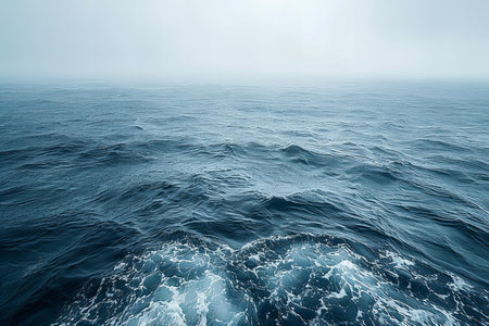 Deep blue sea with waves and fog. Natural background. Toned.の写真素材