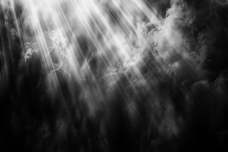Black and white abstract background with clouds and rays of light in itの写真素材