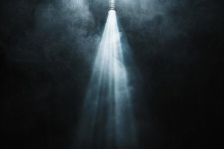 Light from the spotlights on a dark background with smoke and fog