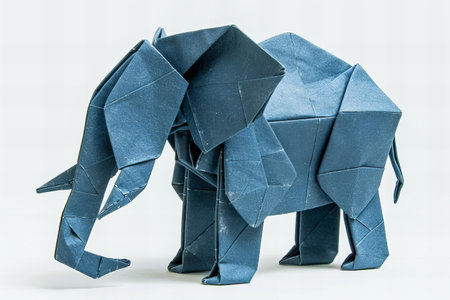 Elephant origami made from blue paper isolated on white background.の写真素材