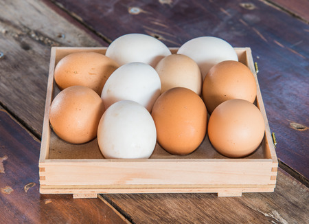 eggs on wood tableの写真素材
