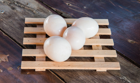 eggs on wood tableの写真素材
